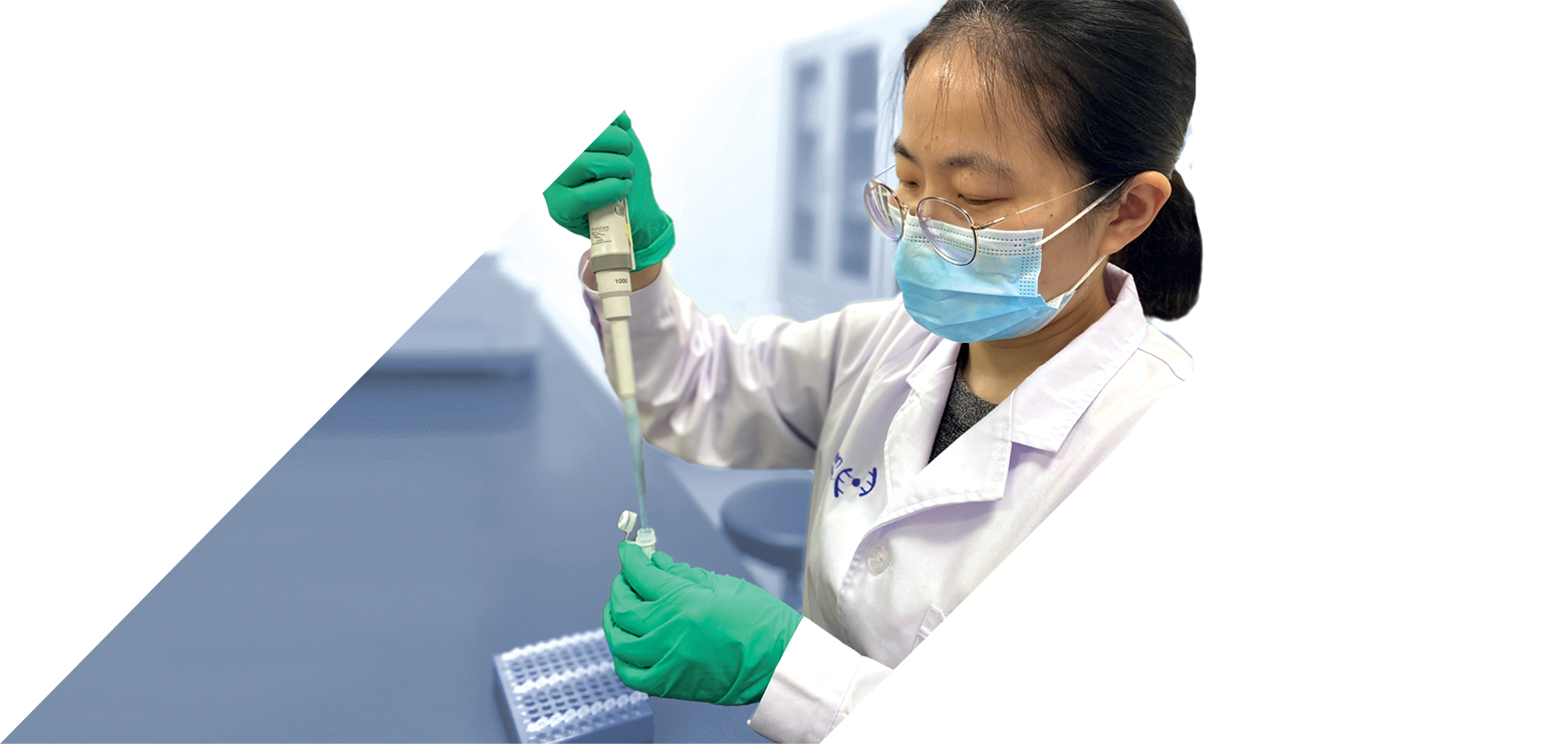 Female scientist filling vials